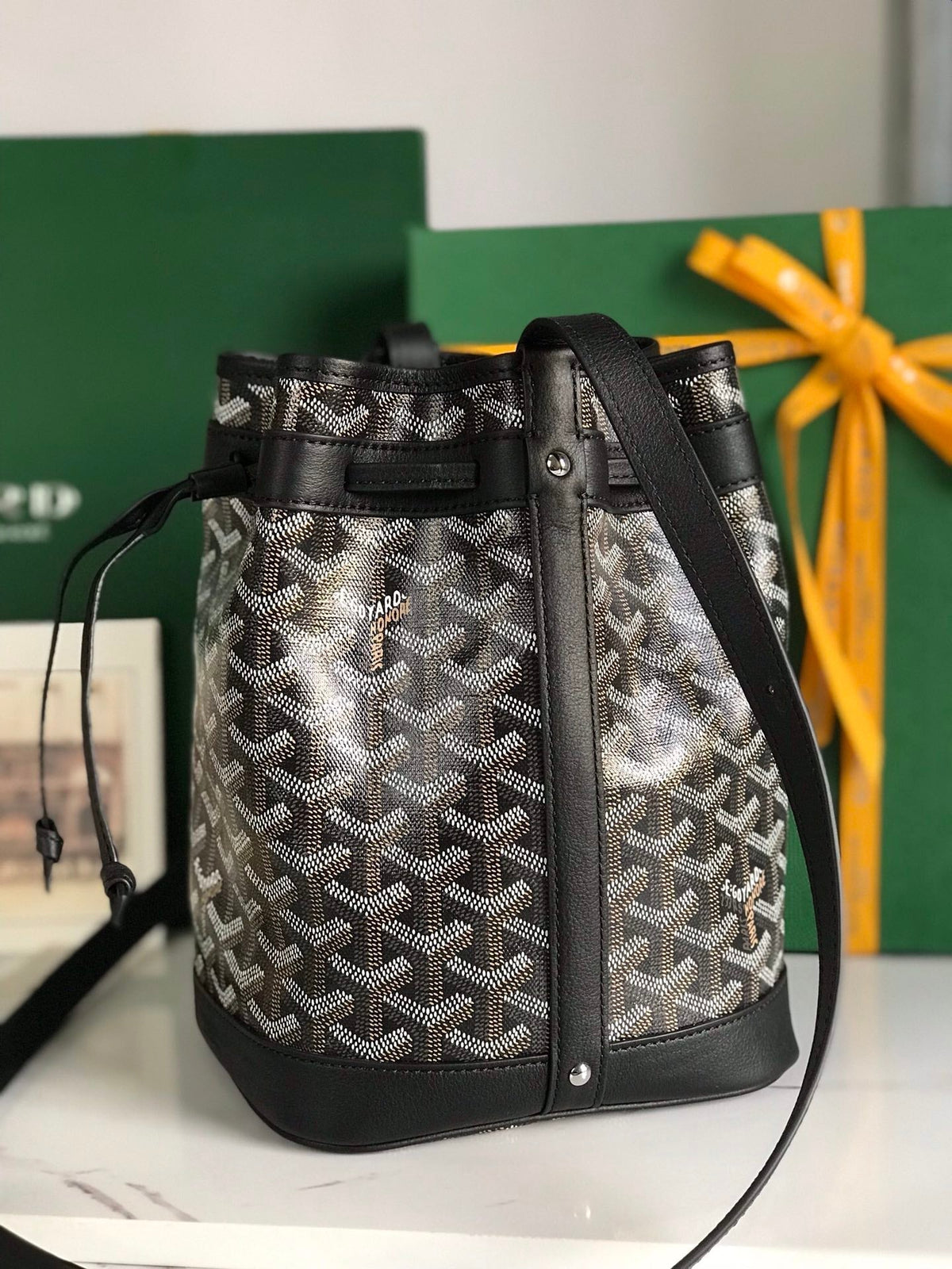 PETIT FLOT BUCKET BAG 22 IN BLACK GOYARDINE CANVAS AND LAMBSKIN TRIM