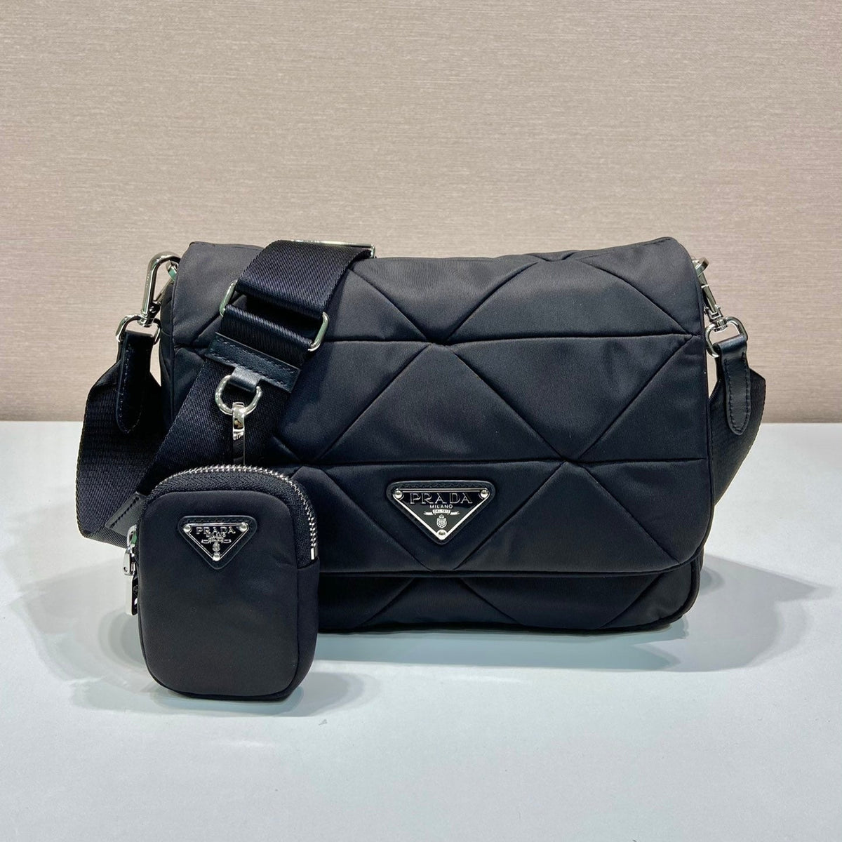 PRADA MEDIUM FLAP BAG 24 IN BLACK TRIANGULAR QUILTED PATTERN RE-NYLON