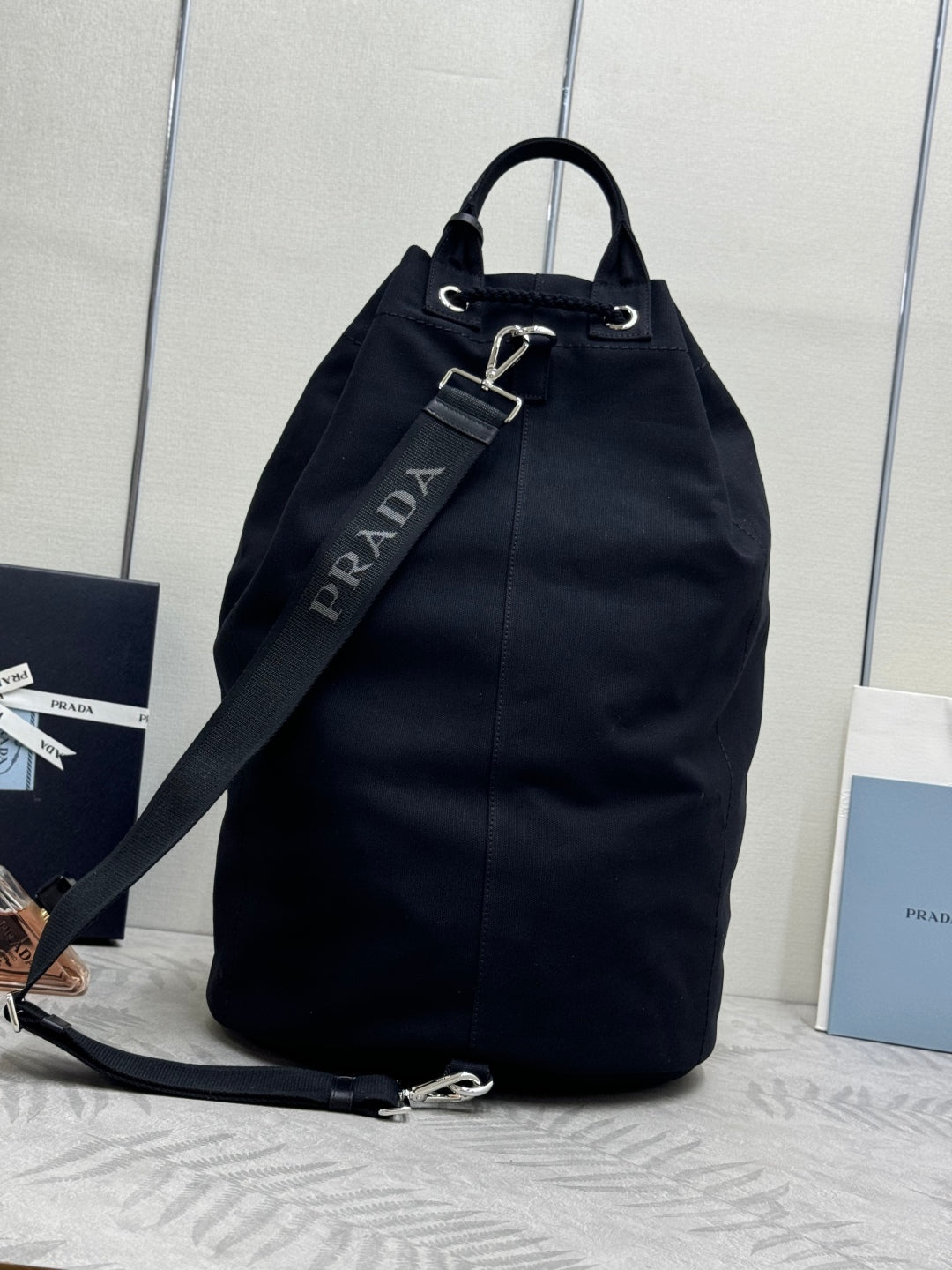 PRADA 25S DRAWSTRING BACKPACK 55 IN BLACK CANVAS LINEN SILVER HARDWARE