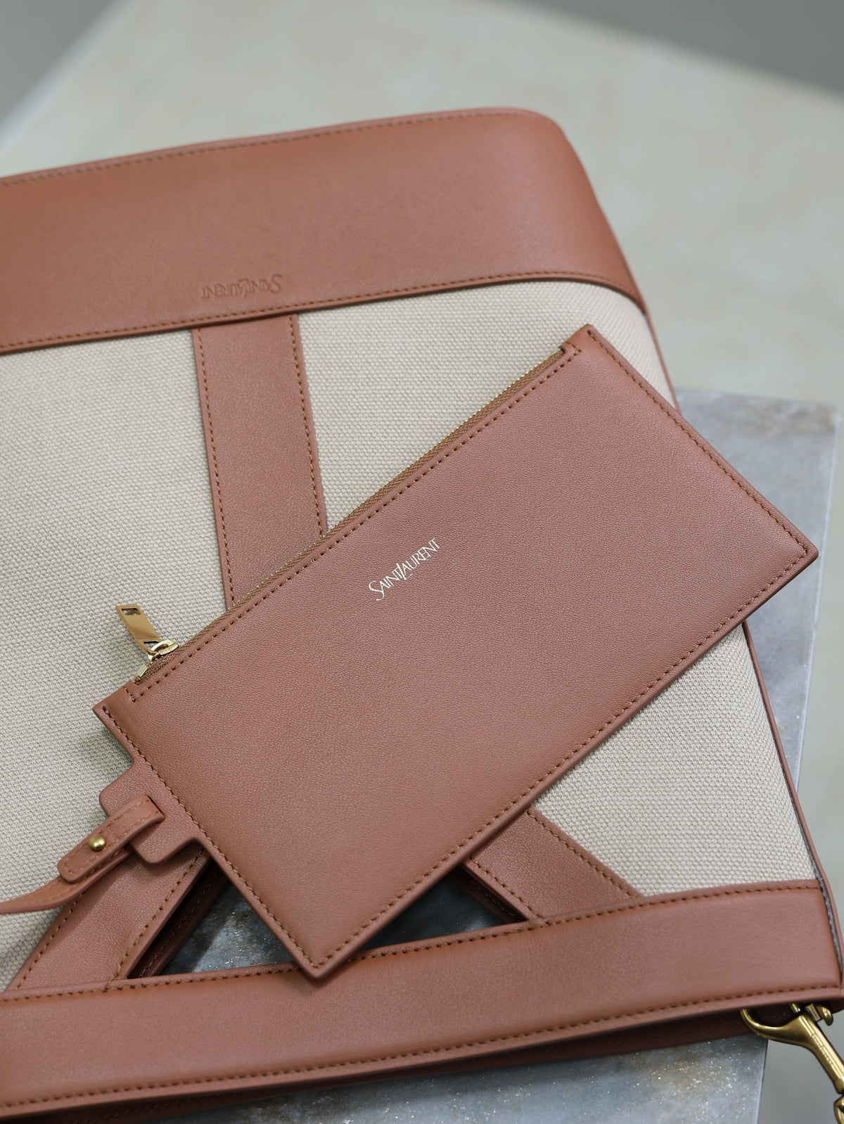 YSL 25S Y SMALL BUCKET 29 IN DESERT DUST AND BRICK CANVAS GOLD HARDWRE