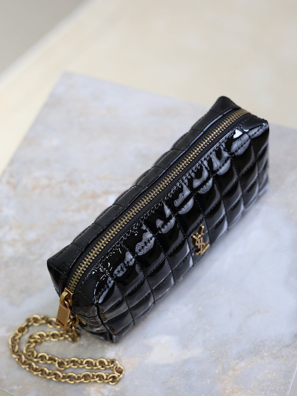 YSL 25S CASSANDRE MATELASSÉ CARRÉ POUCH ON CHAIN 18 IN BLACK SHINY CALFSKIN