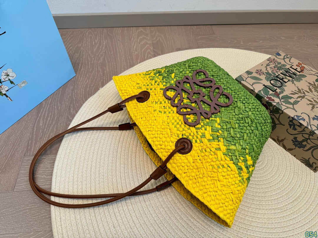 LOE SMALL ANAGRAM BASKET 28 BAG IN YELLOW MIX GREEN IRACA PALM AND CALFSKIN