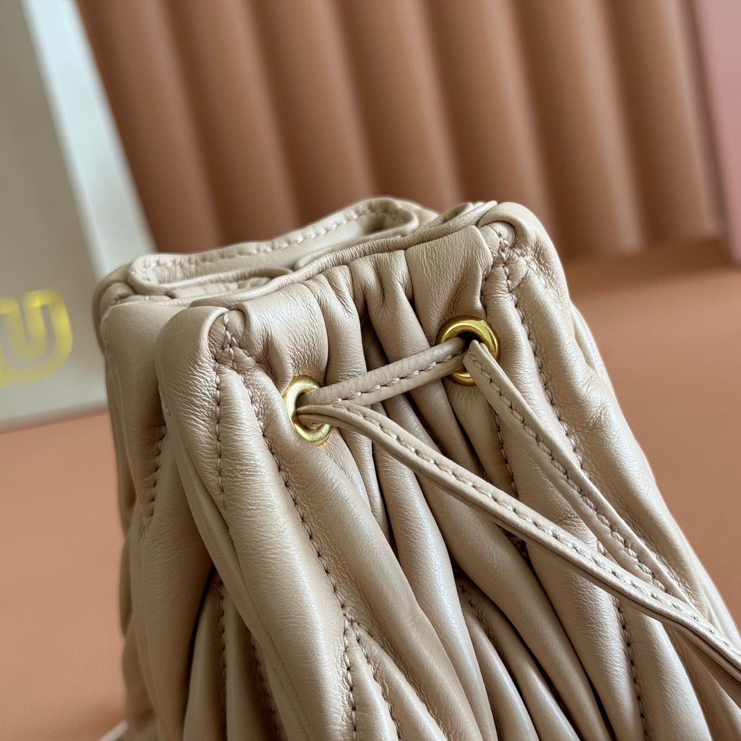 MIUMIU 26S MATELASSE POUCH BAG 16 IN LIGHT BEIGE CALFSKIN GOLD HARDWARE