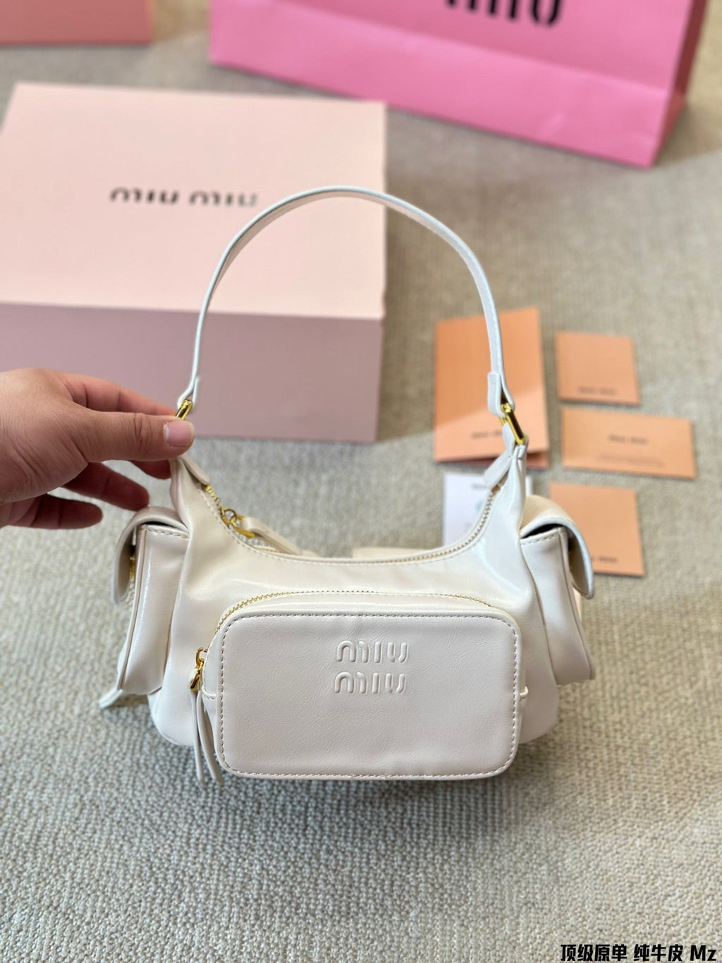 PUCKET BAG 27 IN WHITE CALFSKIN