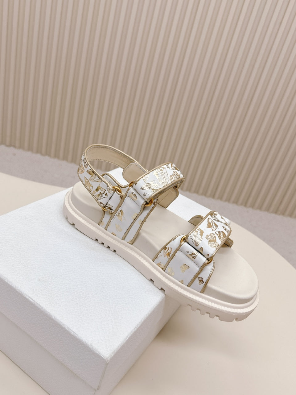 DIOR BACK-STRAP SANDALS 25S IN CREAM WHITE AND GOLD CALFSKIN WITH BUTTERFLY MOTIF